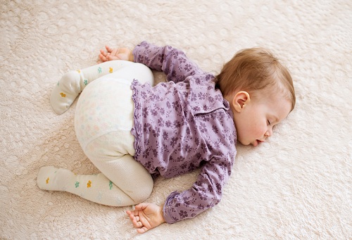 baby sleeping on face