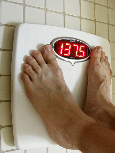 Scale with feet