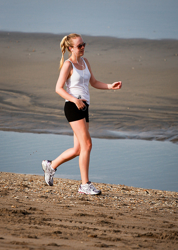 Woman walking on beach