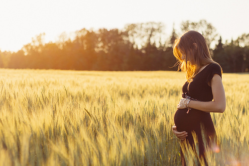 Pregnant Woman in Field