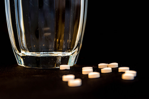 Pills in a glass